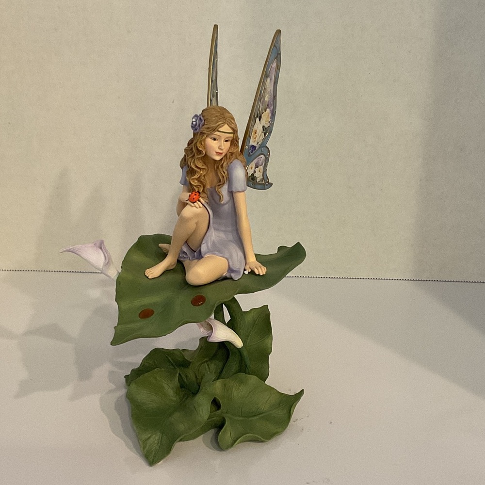 Lena Liu “The Bradford Exchange “Fairy Figurine on Leaf with Flowers